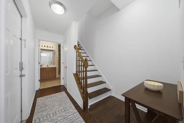 a view of a hallway with seating area