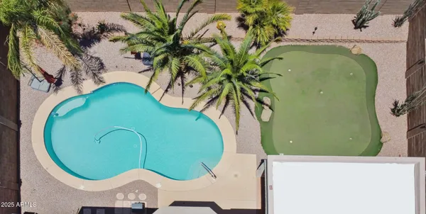 an aerial view of a swimming pool
