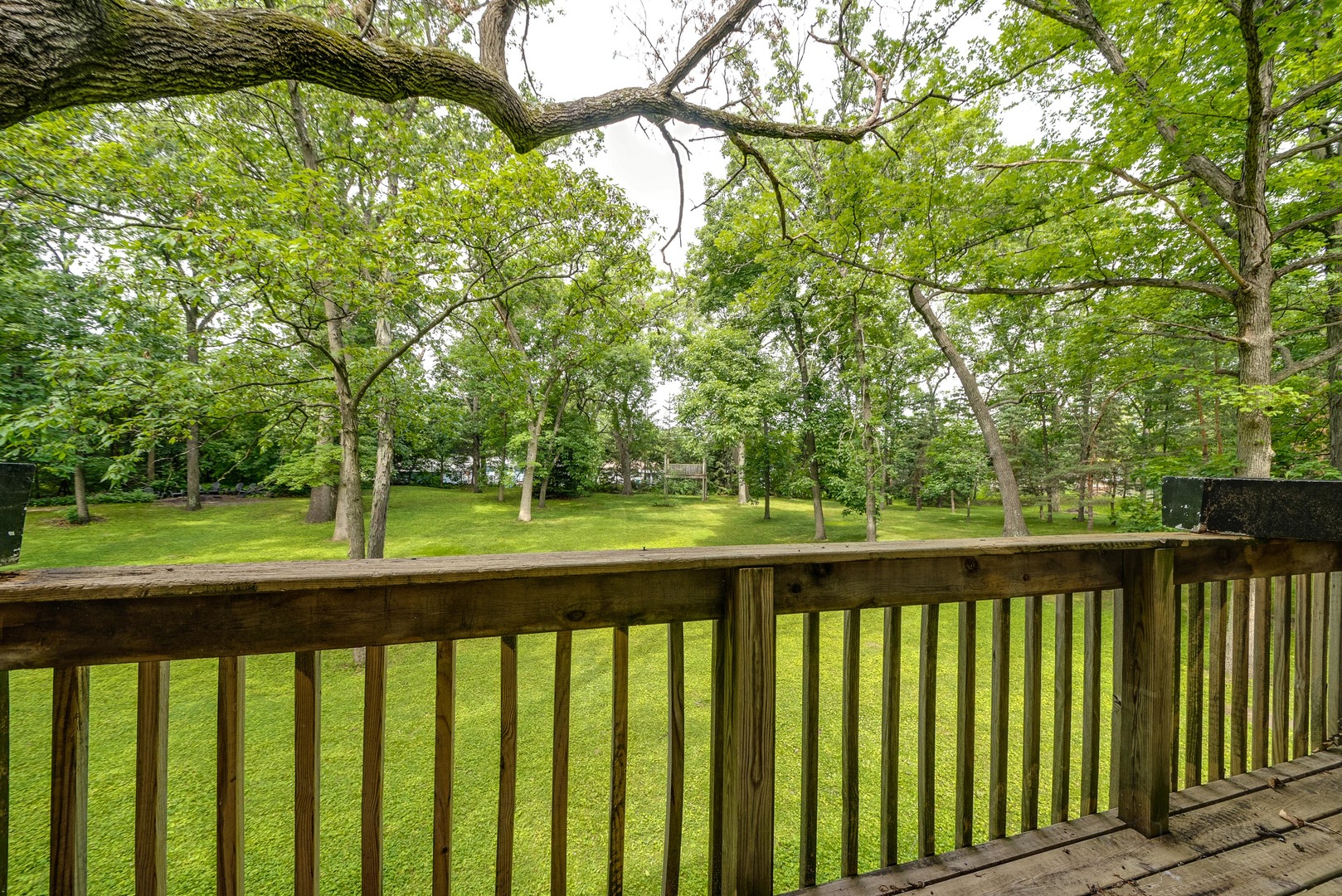 703 Hickory Road Woodstock, IL 60098 - Photo 20 of 33 a view of outdoor space with deck and yard