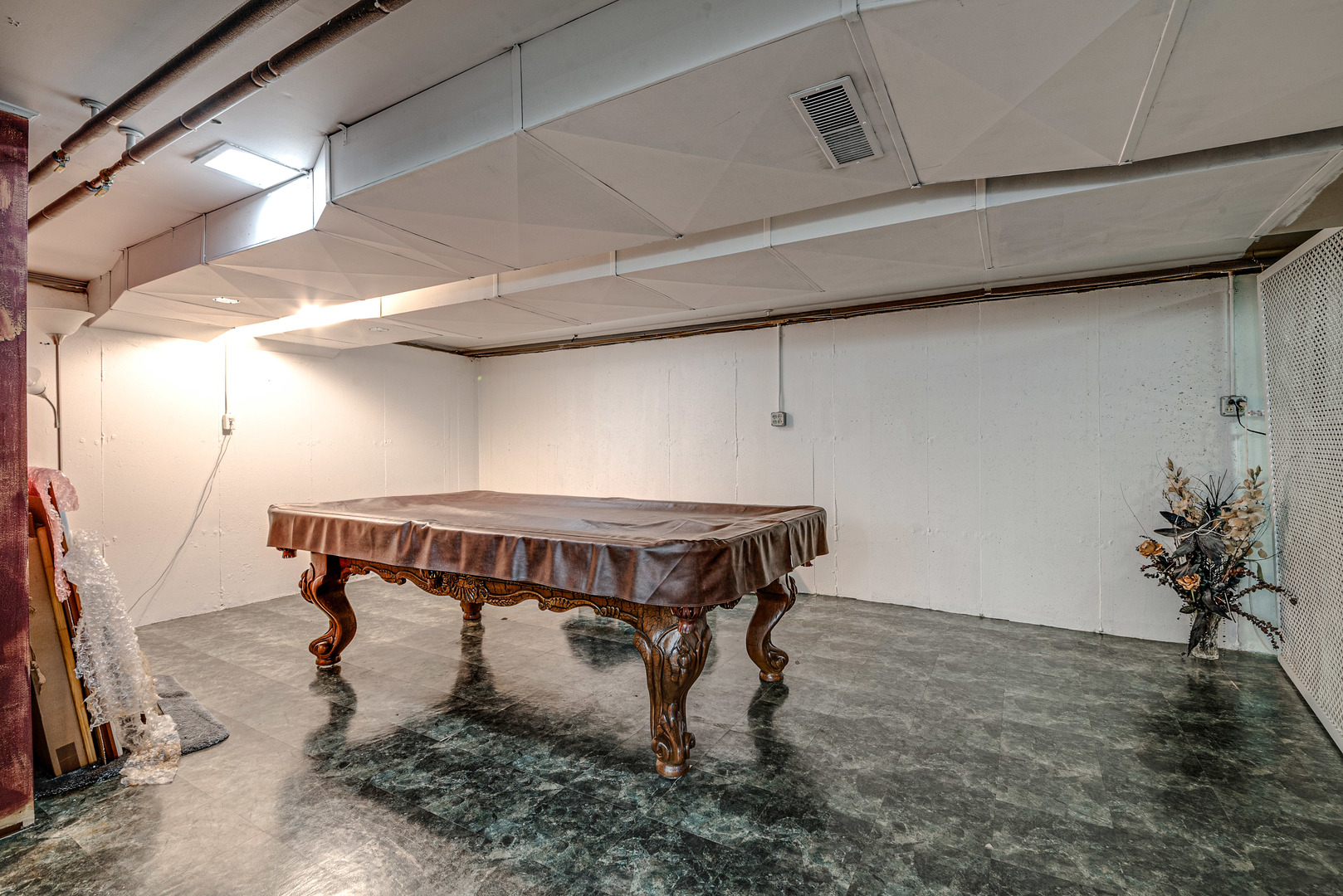 703 Hickory Road Woodstock, IL 60098 - Photo 26 of 33 a room with wooden walls and table