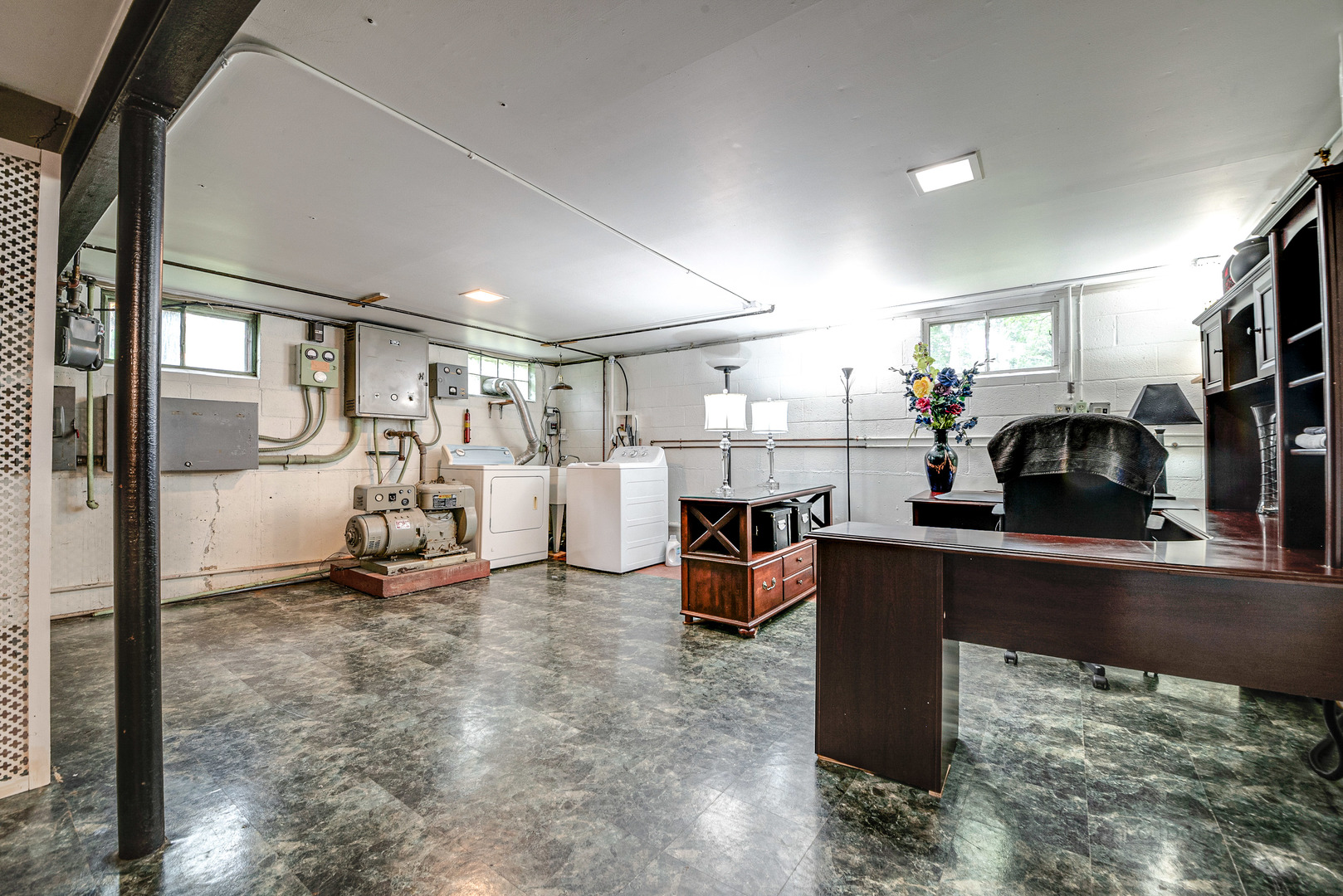 703 Hickory Road Woodstock, IL 60098 - Photo 28 of 33 a view of a living room and workspace