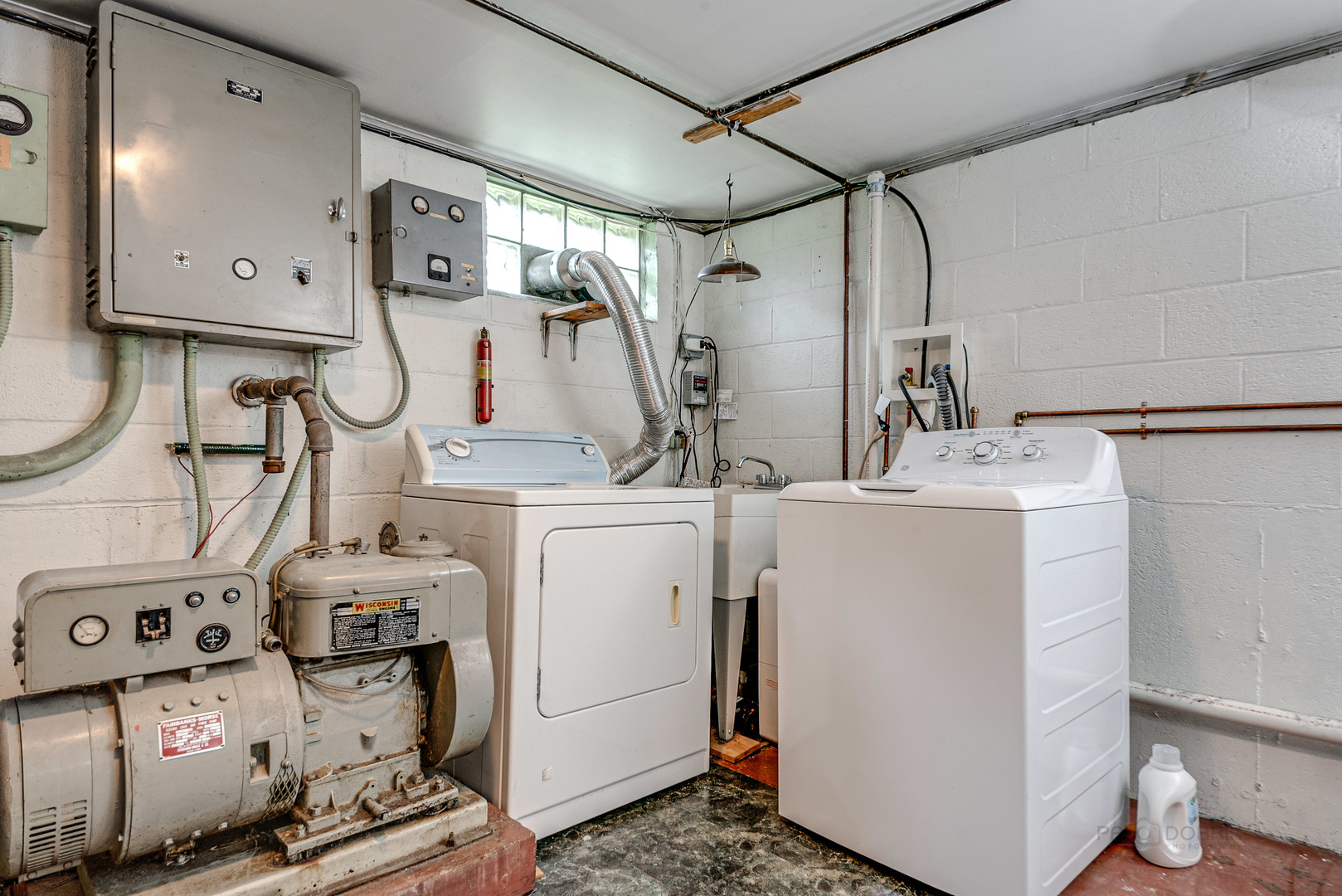 703 Hickory Road Woodstock, IL 60098 - Photo 29 of 33 a utility room with dryer and washer