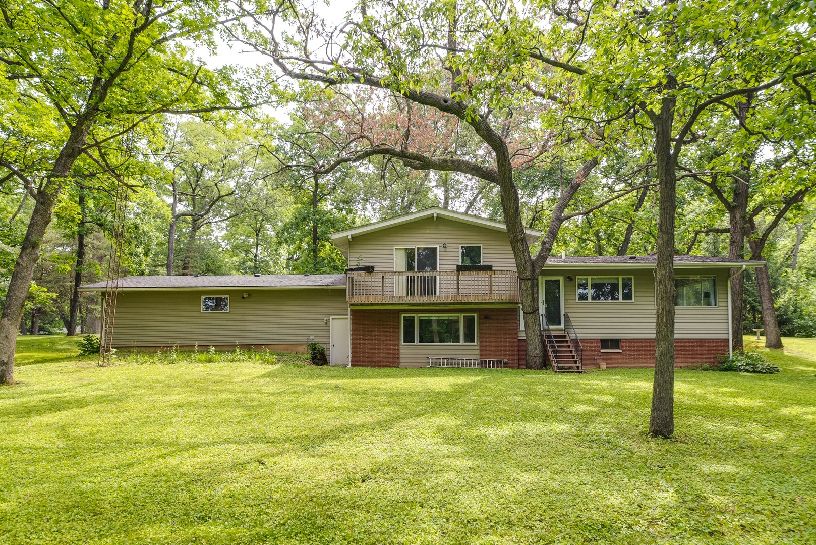 703 Hickory Road Woodstock, IL 60098 - Photo 30 of 33 a view of house with swimming pool