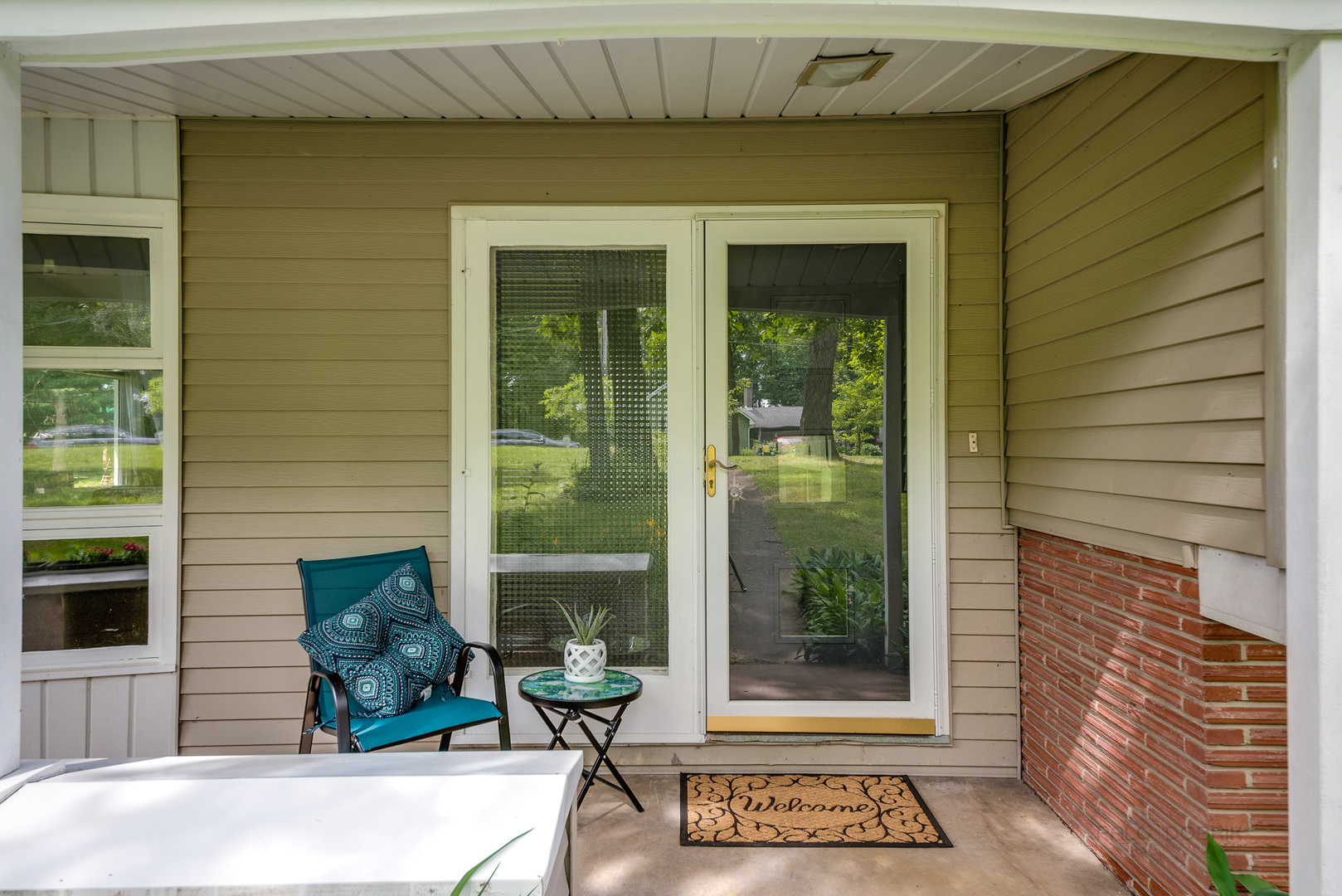 703 Hickory Road Woodstock, IL 60098 - Photo 4 of 33 a view of a entryway door of the house