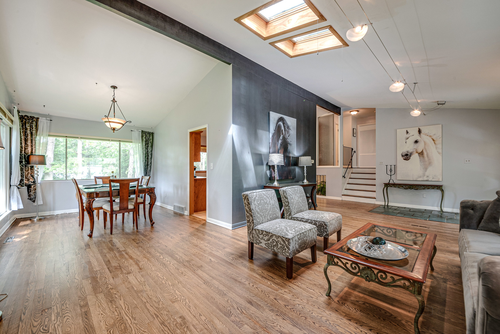 703 Hickory Road Woodstock, IL 60098 - Photo 9 of 33 a living room with furniture and wooden floor
