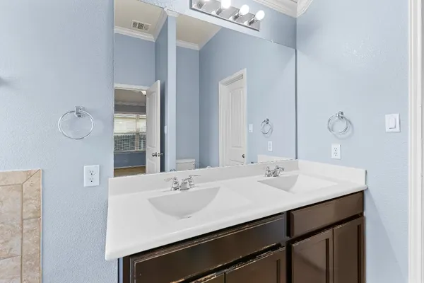 a bathroom with a shower and a bathtub