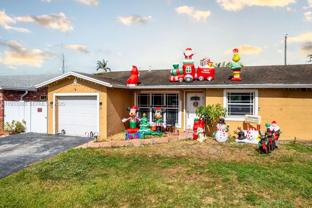 a front view of house with an outdoor living space