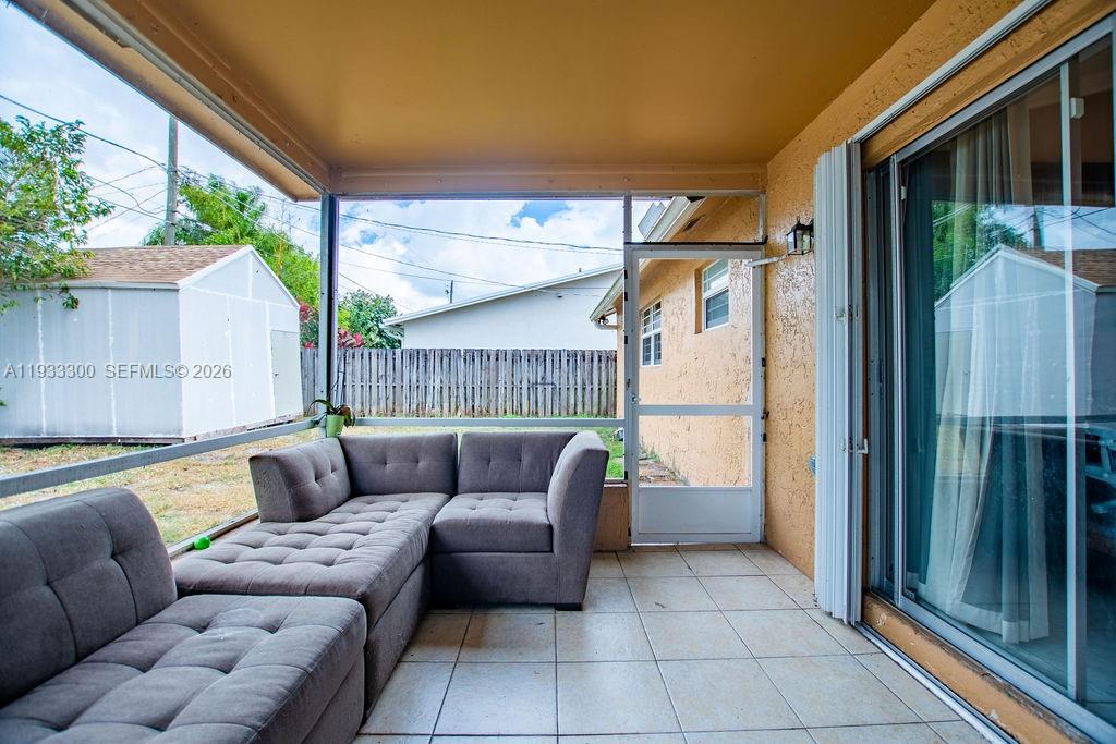 11751 Northwest 32nd Manor Sunrise, FL 33323 - Photo 25 of 32 a outdoor space with patio couch and table