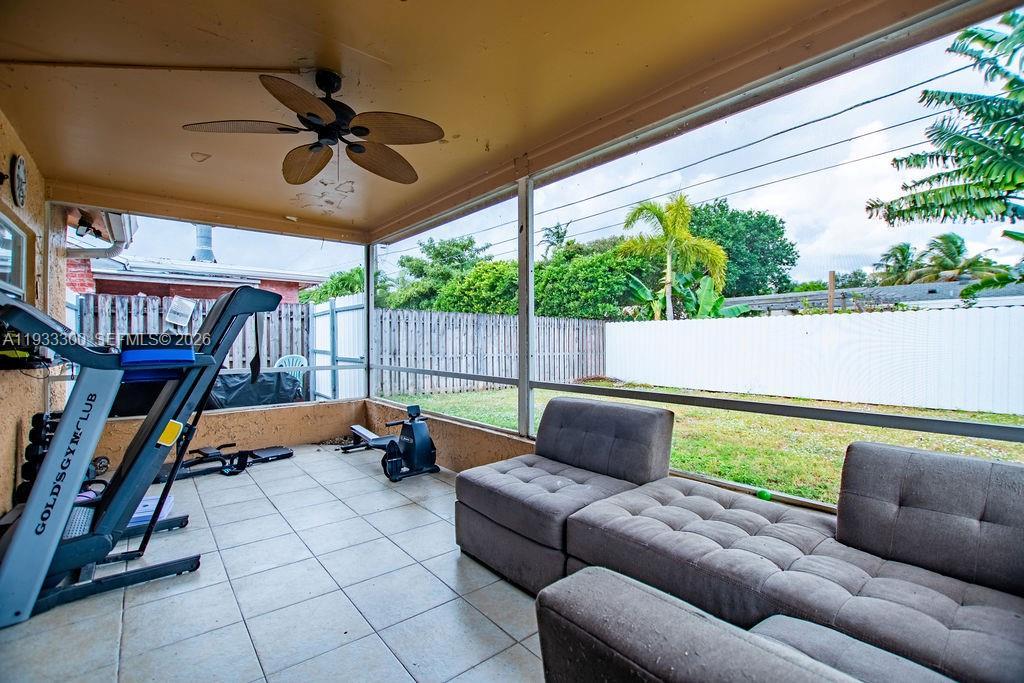 11751 Northwest 32nd Manor Sunrise, FL 33323 - Photo 27 of 32 a outdoor living space with furniture and a fireplace