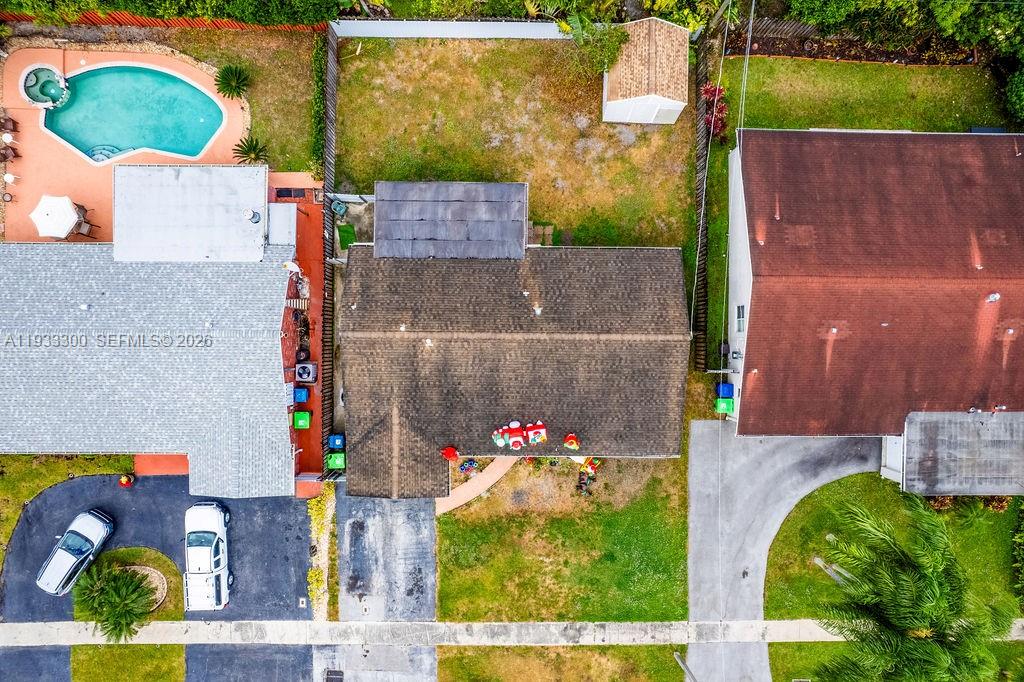 11751 Northwest 32nd Manor Sunrise, FL 33323 - Photo 32 of 32 an aerial view of a houses with outdoor space