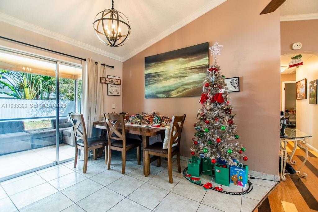 11751 Northwest 32nd Manor Sunrise, FL 33323 - Photo 8 of 32 a view of a dining room with furniture window and outside view