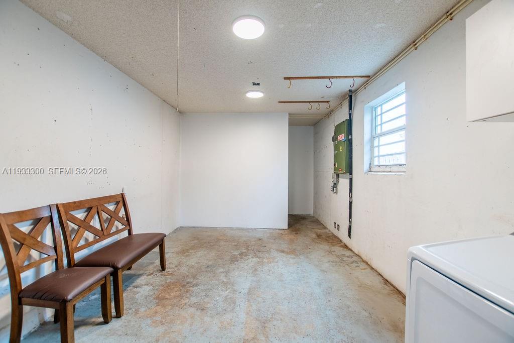 11751 Northwest 32nd Manor Sunrise, FL 33323 - Photo 10 of 32 a view of a livingroom with furniture and windows