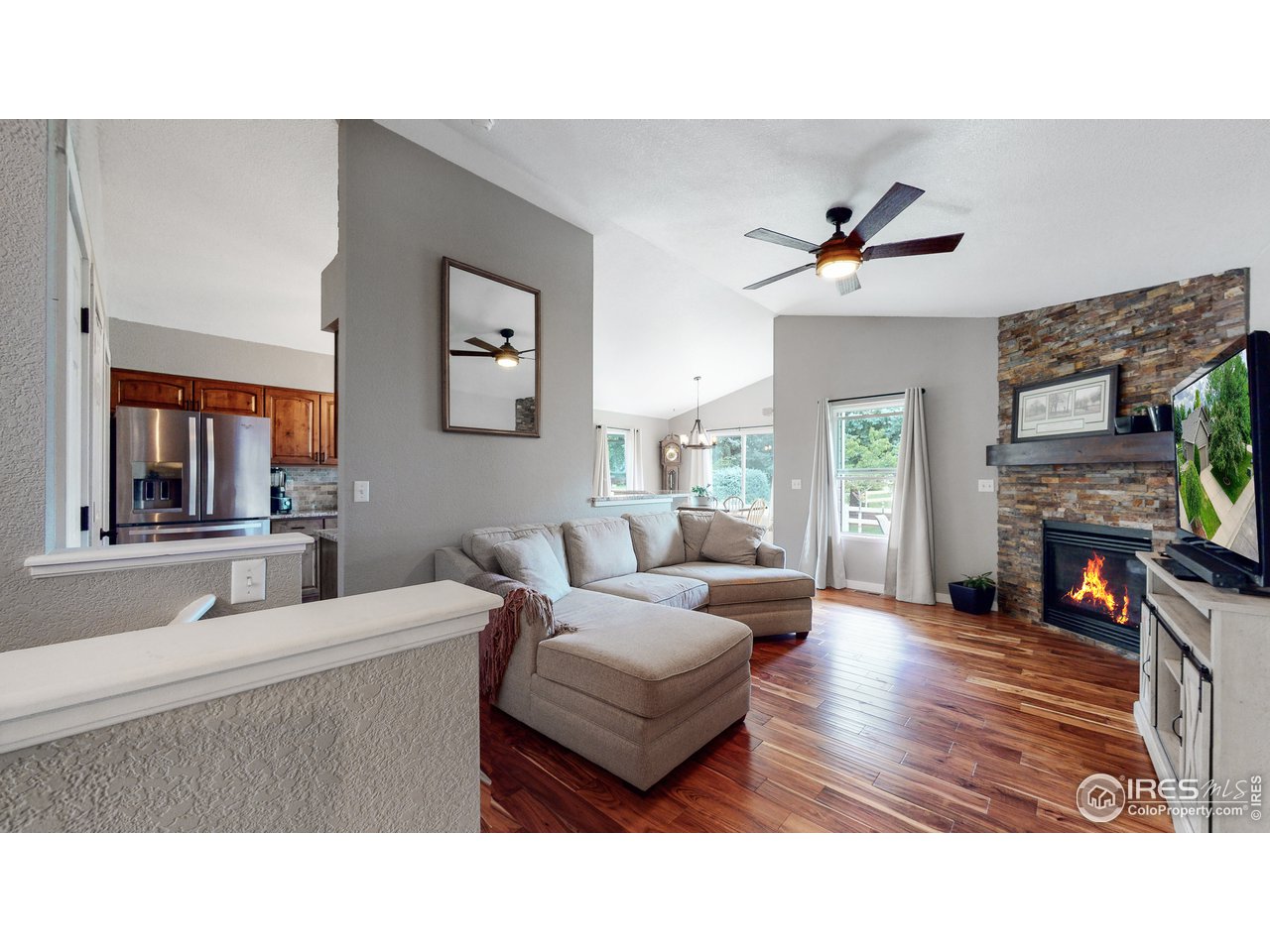 Welcome home to 1215 Black Hawk Road in the peaceful Hawkstone Community