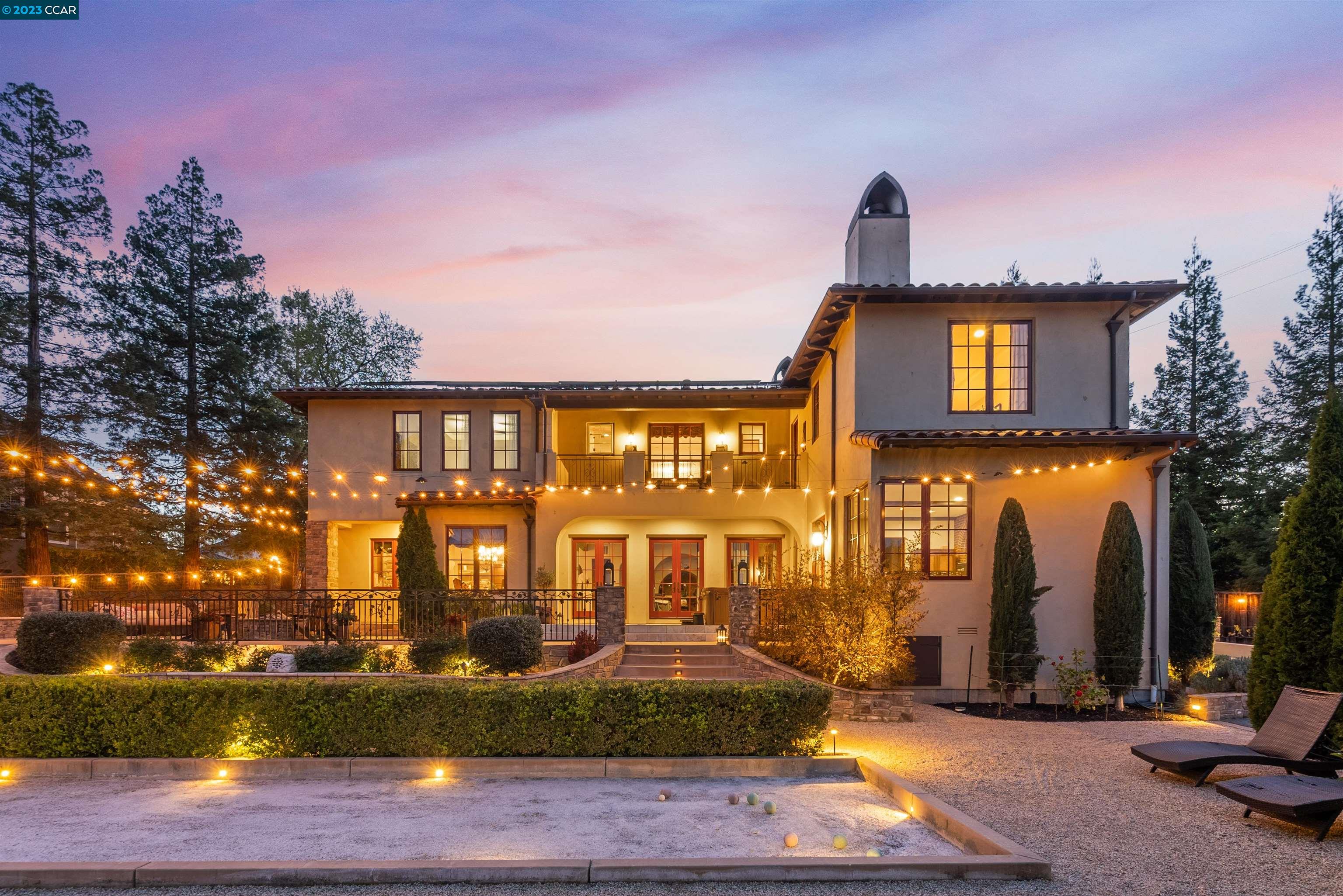 a front view of a house with yard