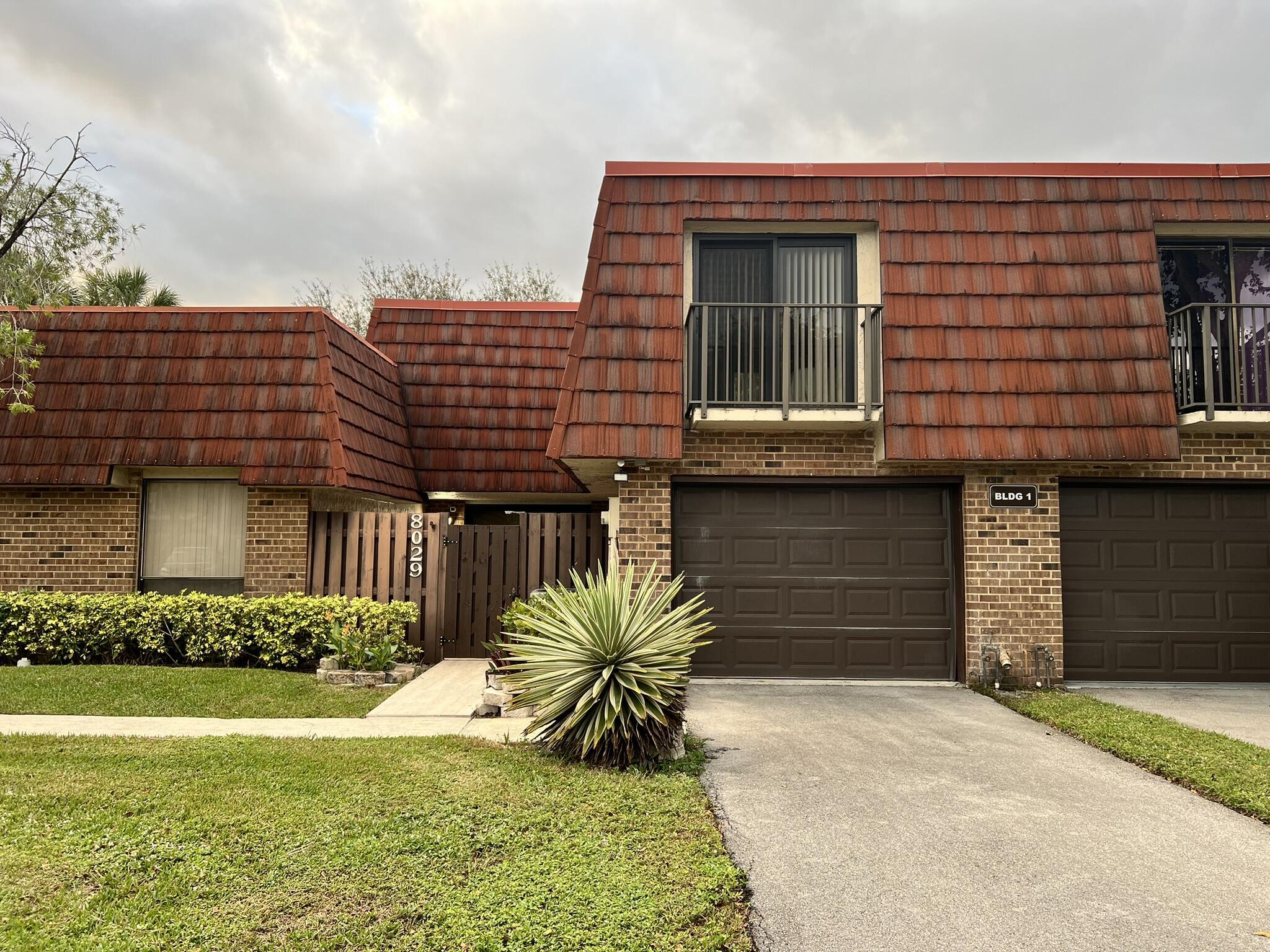 8029 Boca Rio Drive Boca Raton, FL 33433 - Photo 1 of 51 Front