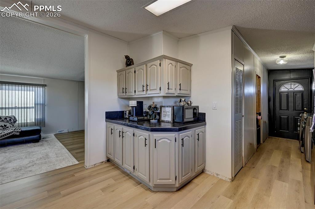 21050 McDaniels Road Calhan, CO 80808 - Photo 15 of 46 a kitchen with stainless steel appliances granite countertop a sink and cabinets