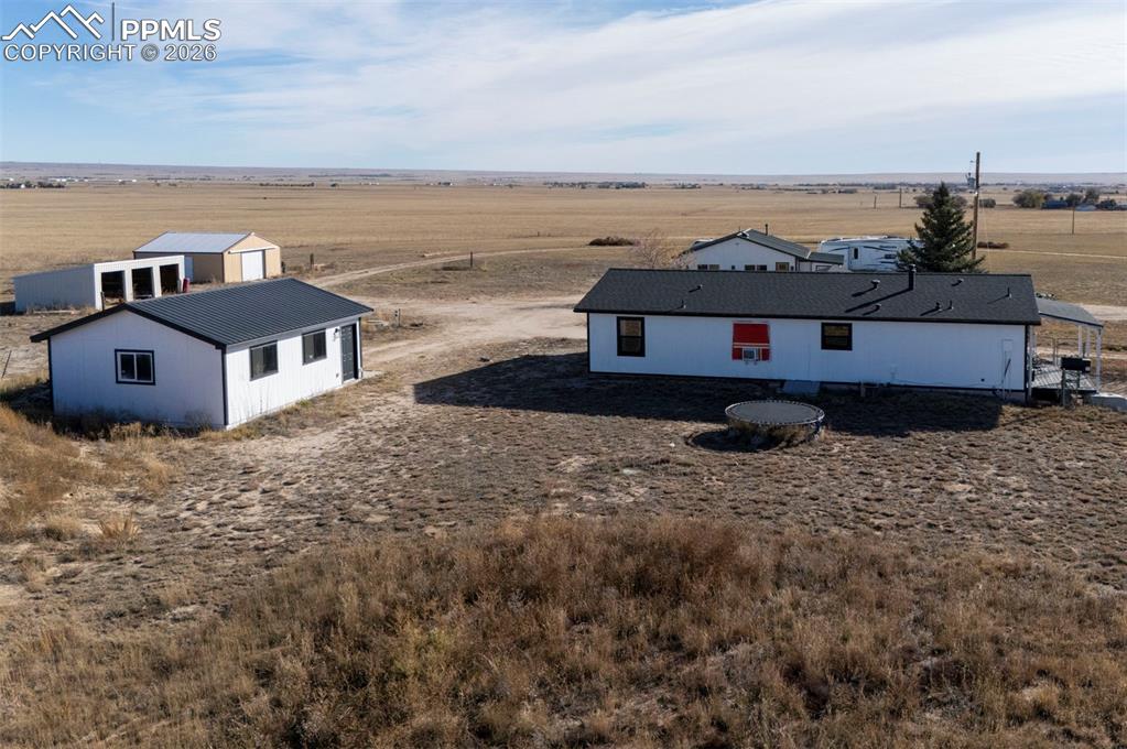 21050 McDaniels Road Calhan, CO 80808 - Photo 5 of 46 a view of a ocean with city view