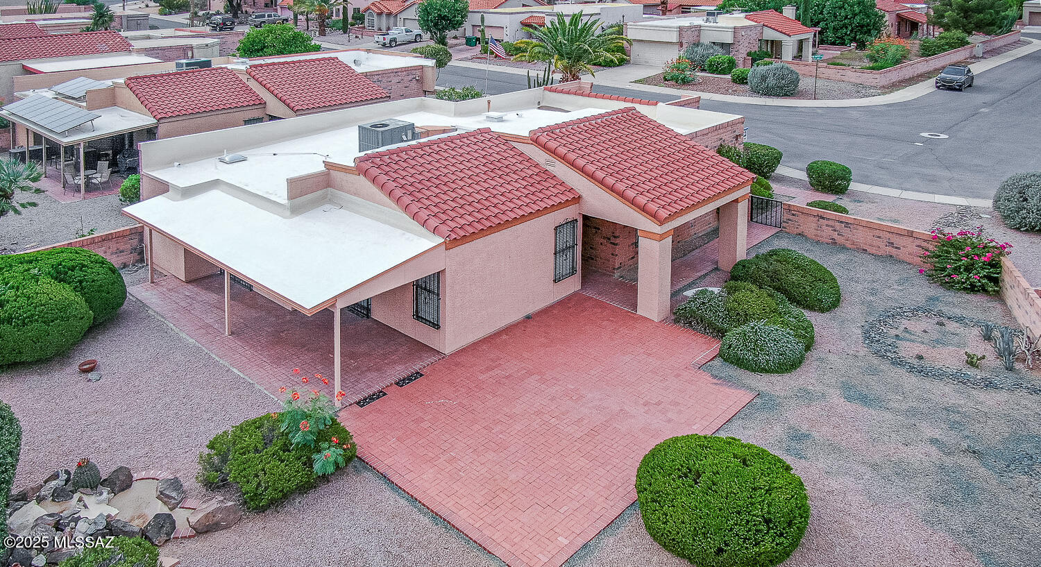 931 West Rio Guaymas Green Valley, AZ 85614 - Photo 36 of 39 an aerial view of a house with garden space and street view