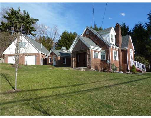 403 McClelland Road Canonsburg, PA 15317 - Photo 1 of 18 Exterior Front. Fabulous corner lot 100 x 180 with lovely updated 3-4 bedroom cape-cod home. Detached workshop and Huge detached 4-car garage with mother-in-law apartment or office above garage!