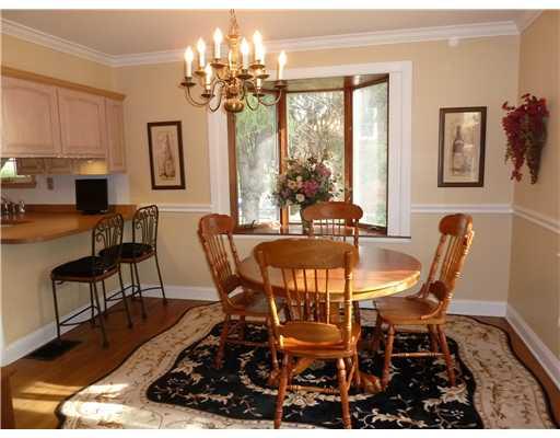 403 McClelland Road Canonsburg, PA 15317 - Photo 6 of 18 Dining Room. Pottery Barn colors, hardwood flooring, crown molding, chair rail, gorgeous bay window, and counter-seating adorn this diningroom.