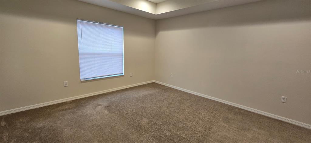 16263 Southwest 48th Circle Ocala, FL 34473 - Photo 11 of 16 an empty room with windows
