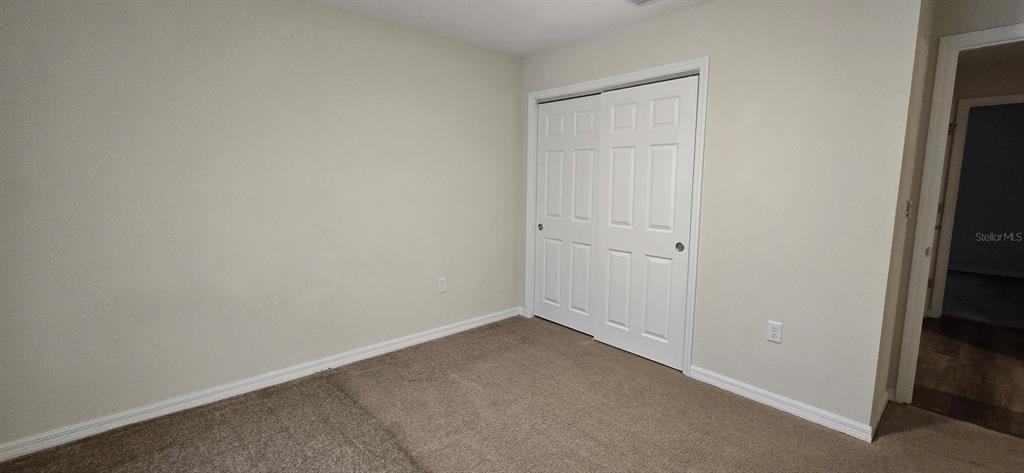 16263 Southwest 48th Circle Ocala, FL 34473 - Photo 8 of 16 an empty room with closet