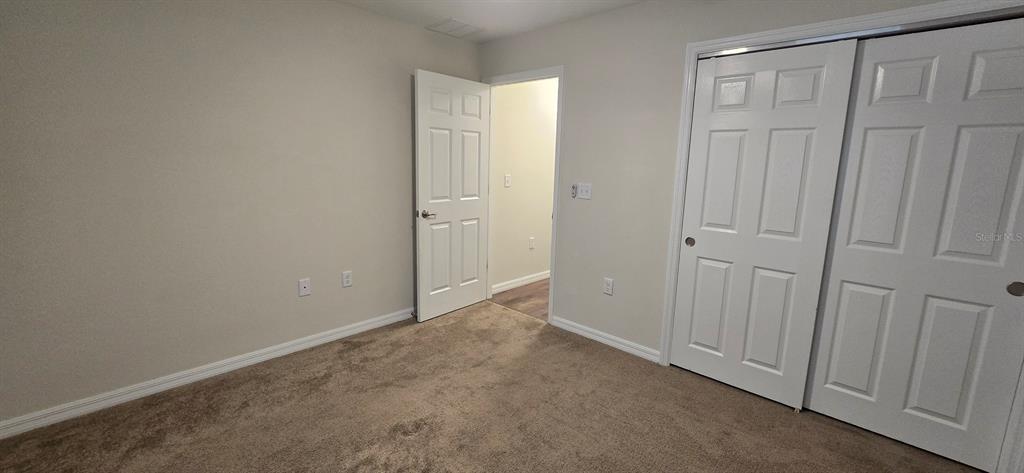 16263 Southwest 48th Circle Ocala, FL 34473 - Photo 9 of 16 a view of an empty room