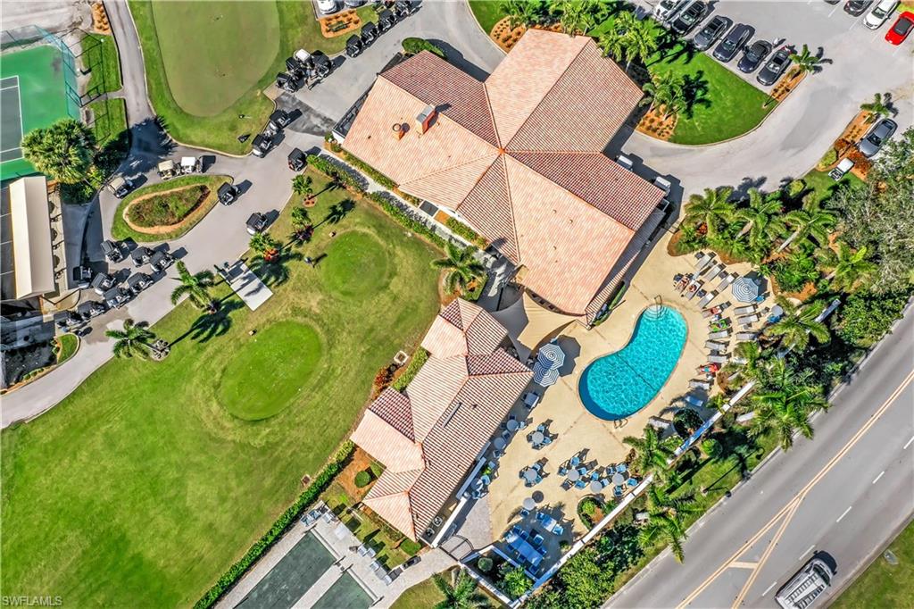 11822 Quail Village Way Naples, FL 34119 - Photo 29 of 34 an aerial view of a swimming pool