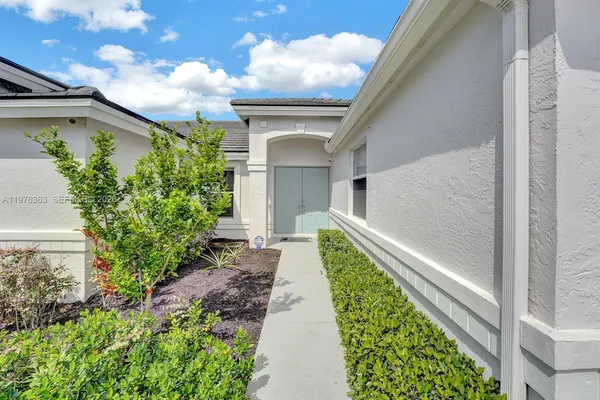 a house view with a garden space