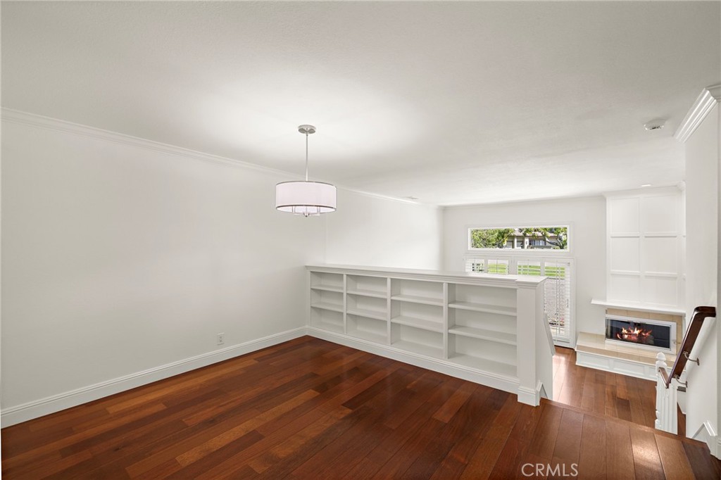 5 Morningside Irvine, CA 92603 - Photo 14 of 58 a view of a room with wooden floor and window