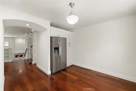 a bathroom with double sink and a mirror