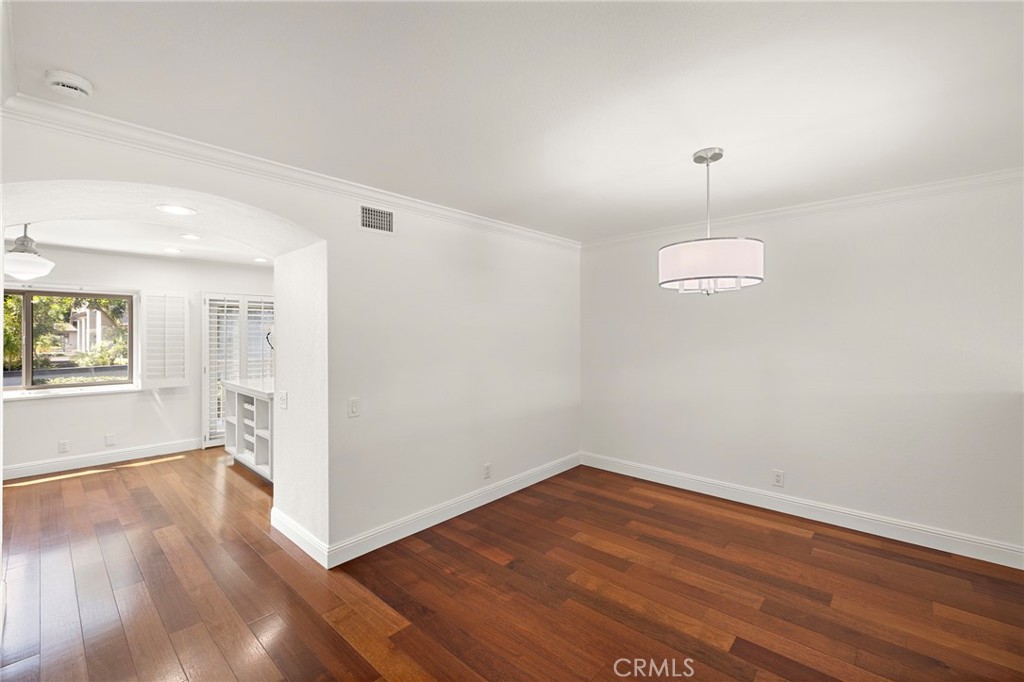 5 Morningside Irvine, CA 92603 - Photo 21 of 58 wooden floor in an empty room with a window