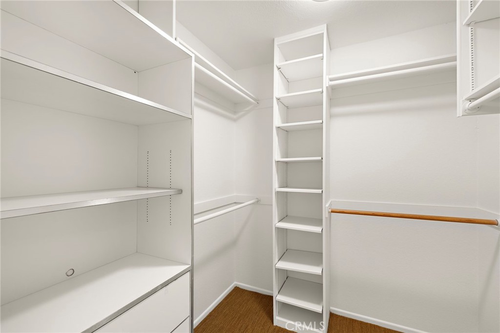 5 Morningside Irvine, CA 92603 - Photo 25 of 58 a view of an empty walk in closet