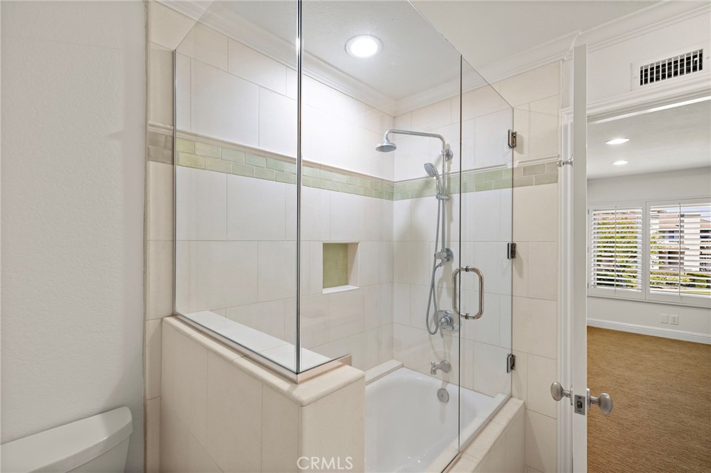 5 Morningside Irvine, CA 92603 - Photo 30 of 58 a bathroom with a shower and a glass door