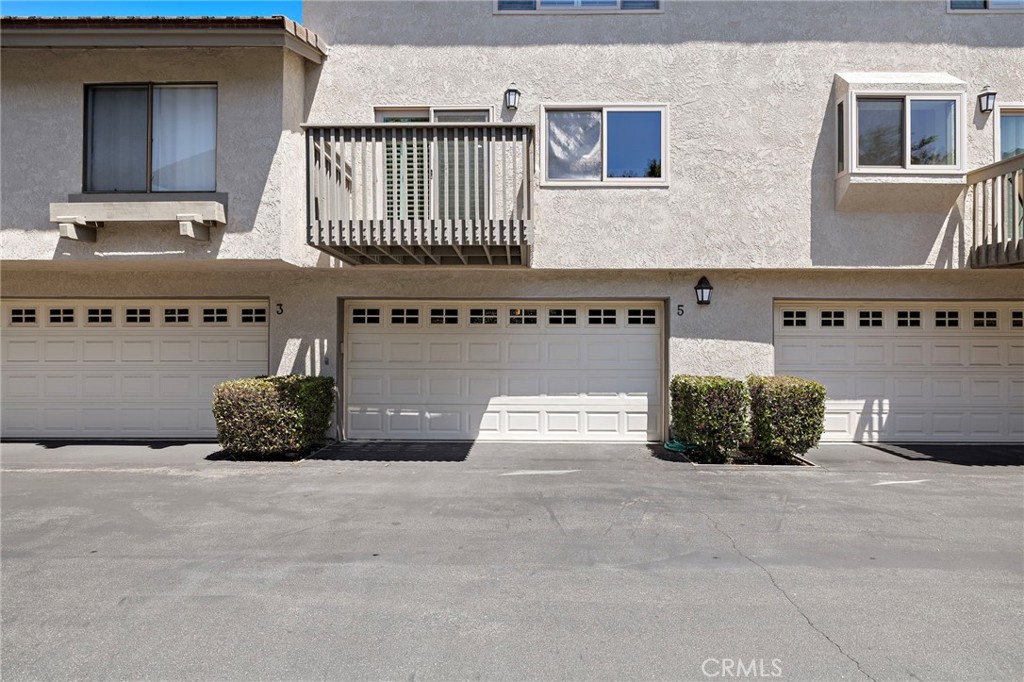 5 Morningside Irvine, CA 92603 - Photo 35 of 58 a front view of a house with outdoor space