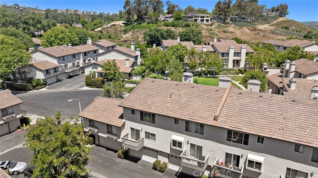 5 Morningside Irvine, CA 92603 - Photo 45 of 58 an aerial view of multiple houses with a yard