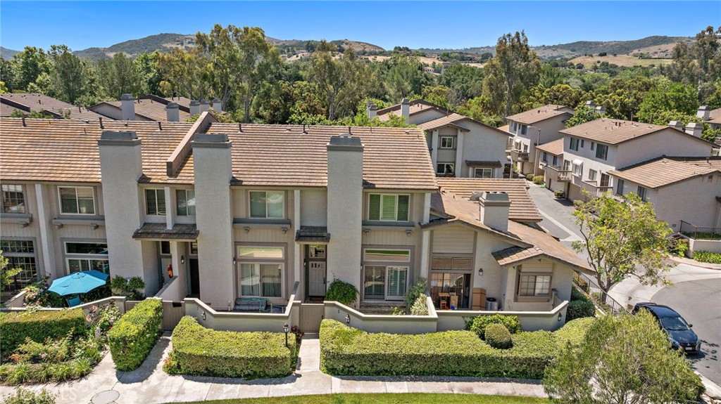 5 Morningside Irvine, CA 92603 - Photo 50 of 58 front view of a house with a yard