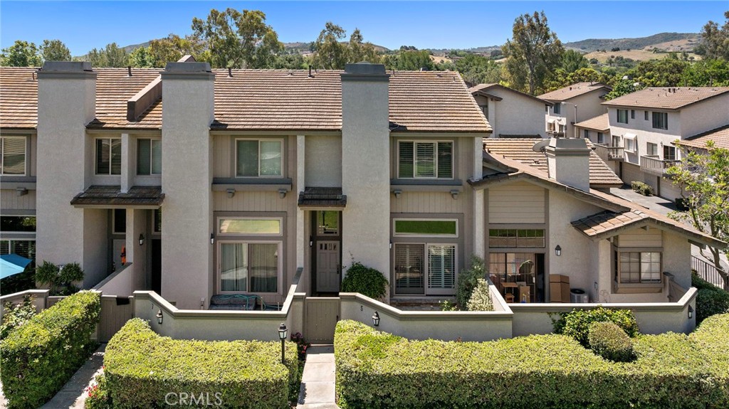 5 Morningside Irvine, CA 92603 - Photo 52 of 58 front view of a house with a yard