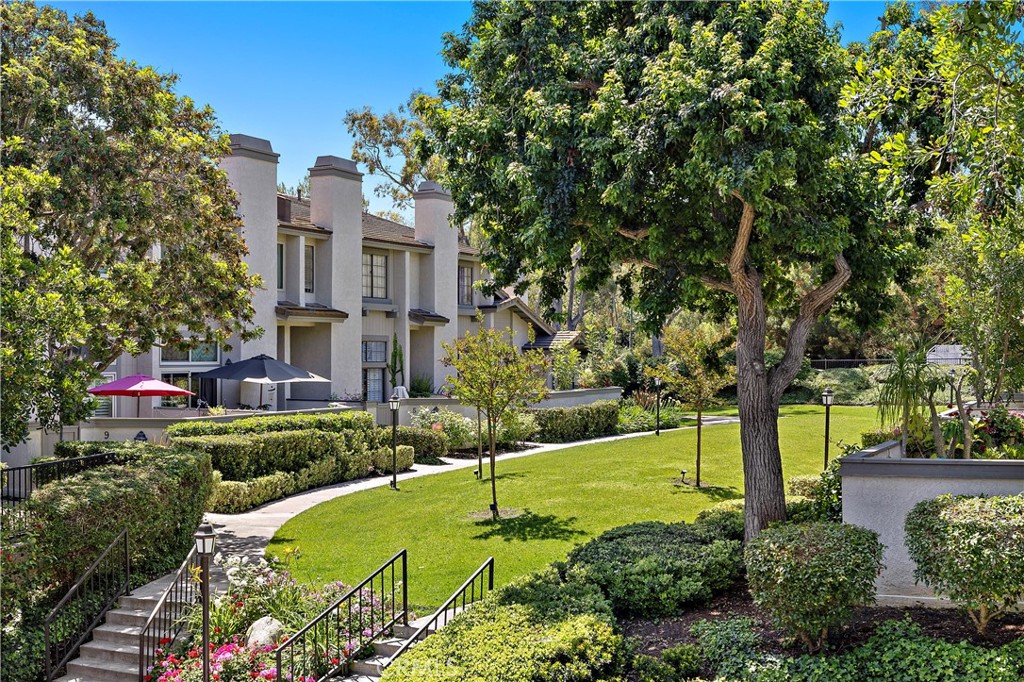 5 Morningside Irvine, CA 92603 - Photo 54 of 58 a front view of a house with a yard