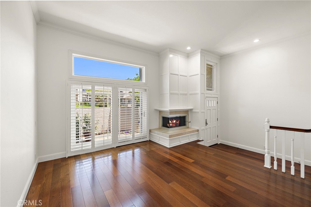 5 Morningside Irvine, CA 92603 - Photo 8 of 58 a view of a room with wooden floor and a window