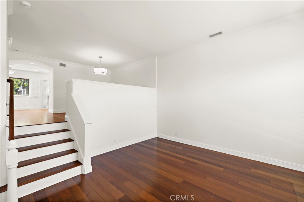 5 Morningside Irvine, CA 92603 - Photo 10 of 58 a view of a room with wooden floor and white walls
