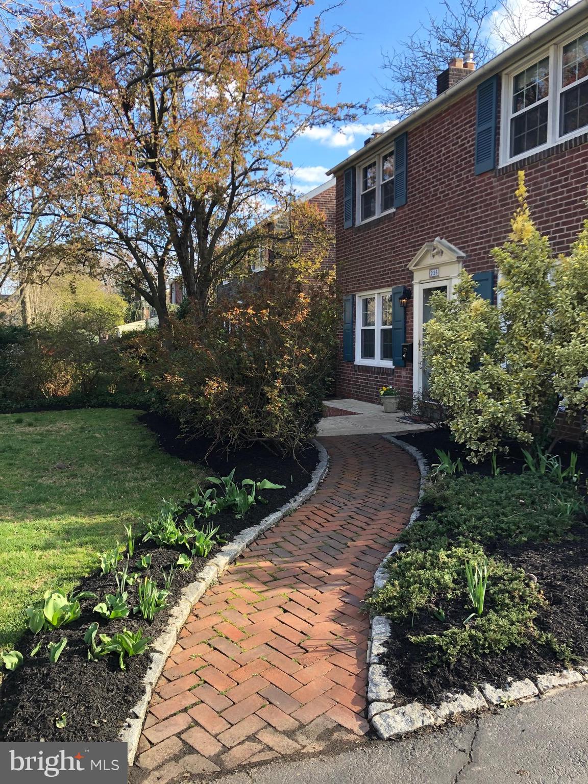 226 Crosshill Road Wynnewood, PA 19096 - Photo 1 of 26 a front view of a house with garden