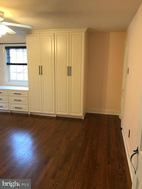 226 Crosshill Road Wynnewood, PA 19096 - Photo 12 of 26 an empty room with wooden floor and windows