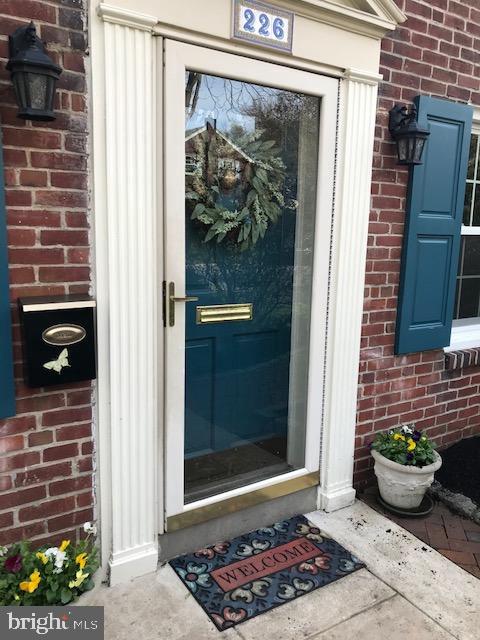 226 Crosshill Road Wynnewood, PA 19096 - Photo 3 of 26 a view of a door and chair and door