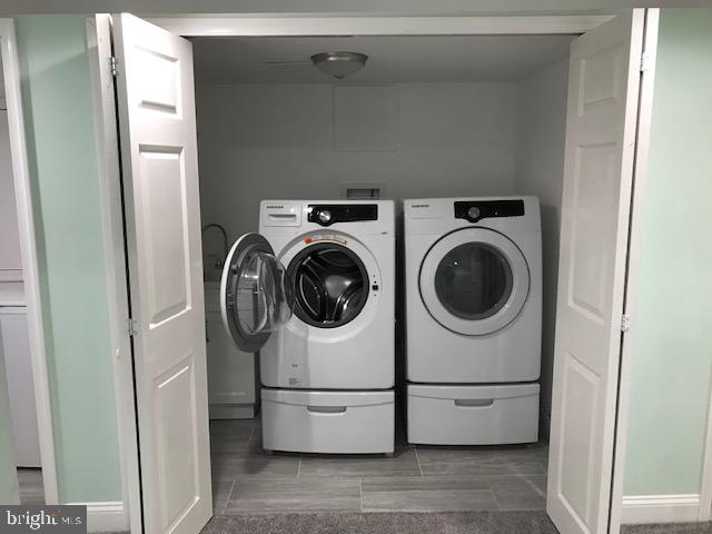 226 Crosshill Road Wynnewood, PA 19096 - Photo 22 of 26 a utility room with dryer and washer