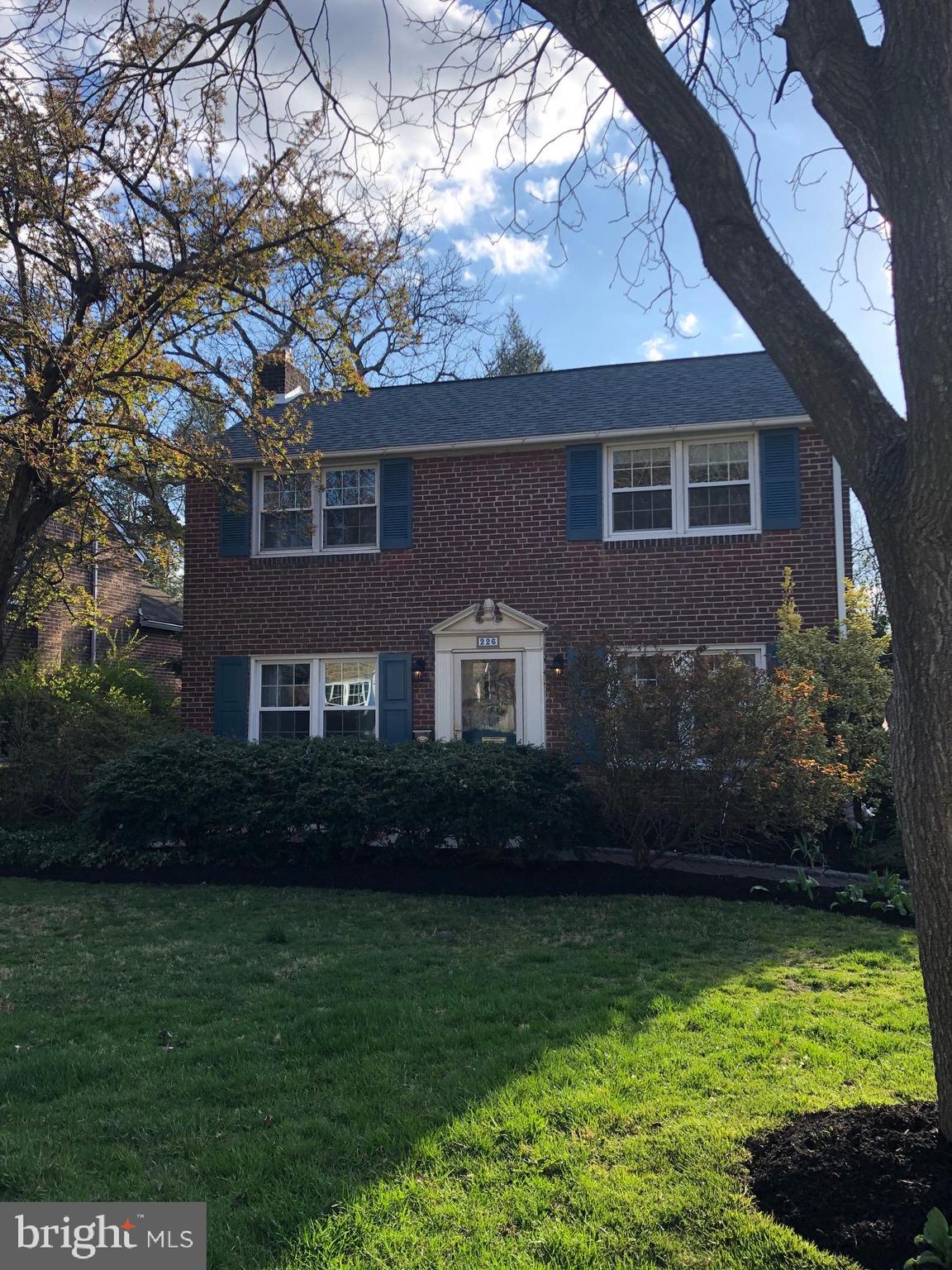 226 Crosshill Road Wynnewood, PA 19096 - Photo 25 of 26 a front view of a house with a yard