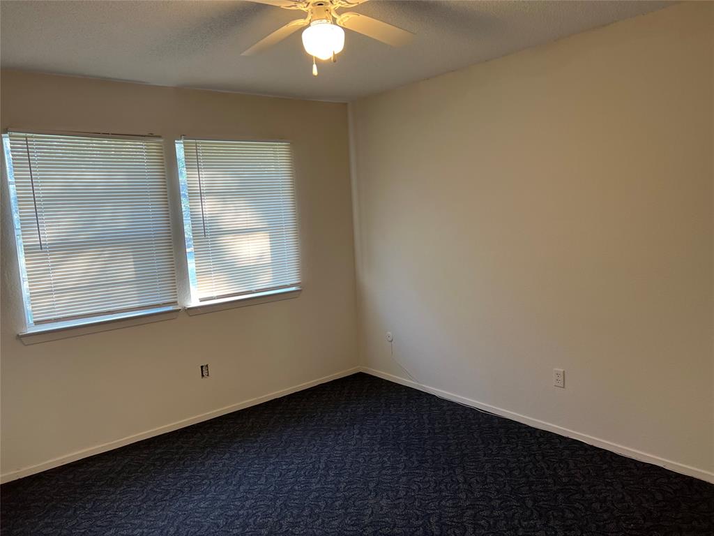 3711 Greenwood Road Weatherford, TX 76088 - Photo 12 of 15 an empty room with a window