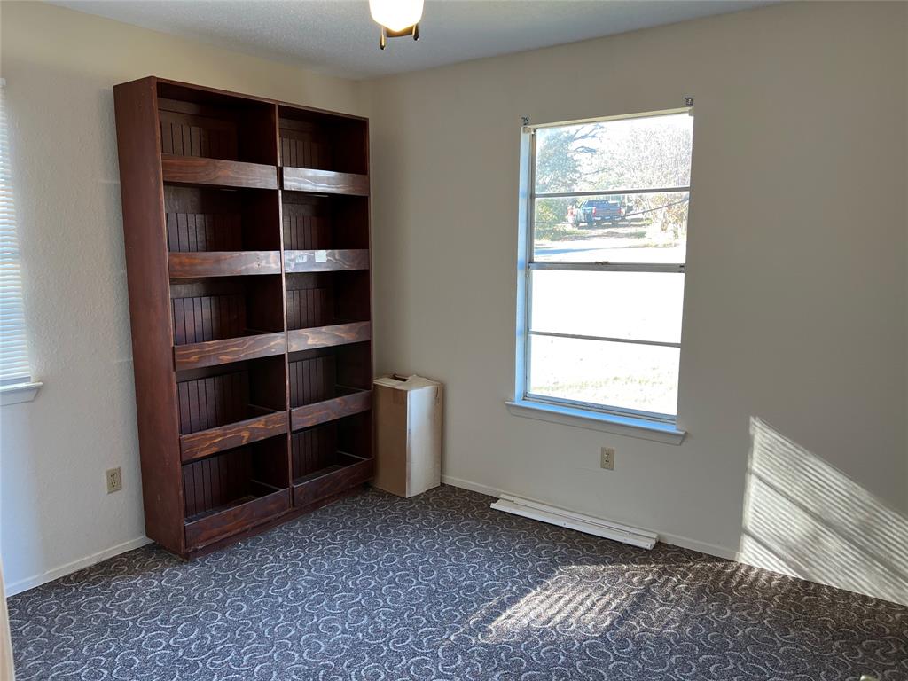 3711 Greenwood Road Weatherford, TX 76088 - Photo 14 of 15 a view of an empty room with a window