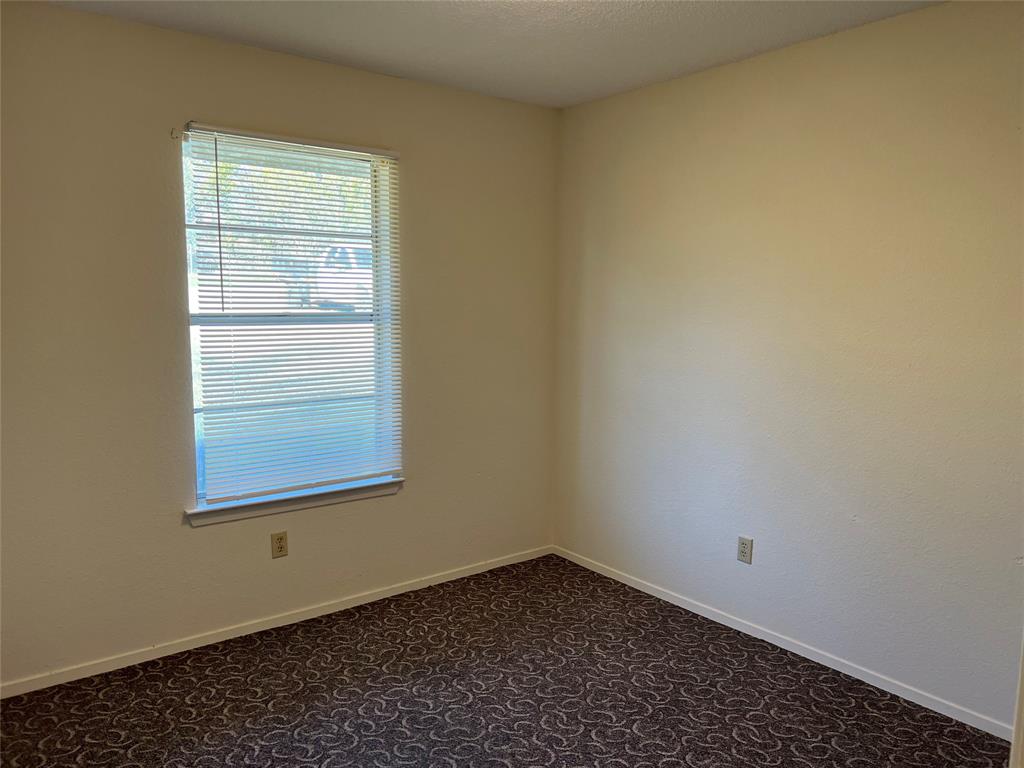 3711 Greenwood Road Weatherford, TX 76088 - Photo 15 of 15 an empty room with a window