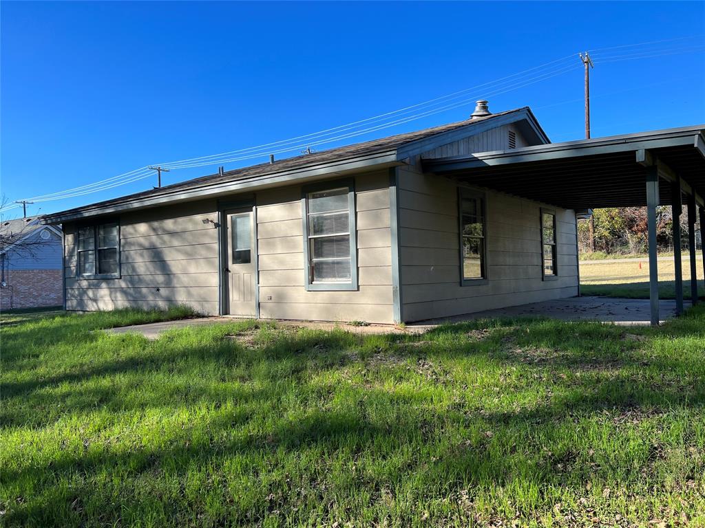 3711 Greenwood Road Weatherford, TX 76088 - Photo 4 of 15 a front view of a house with a garden